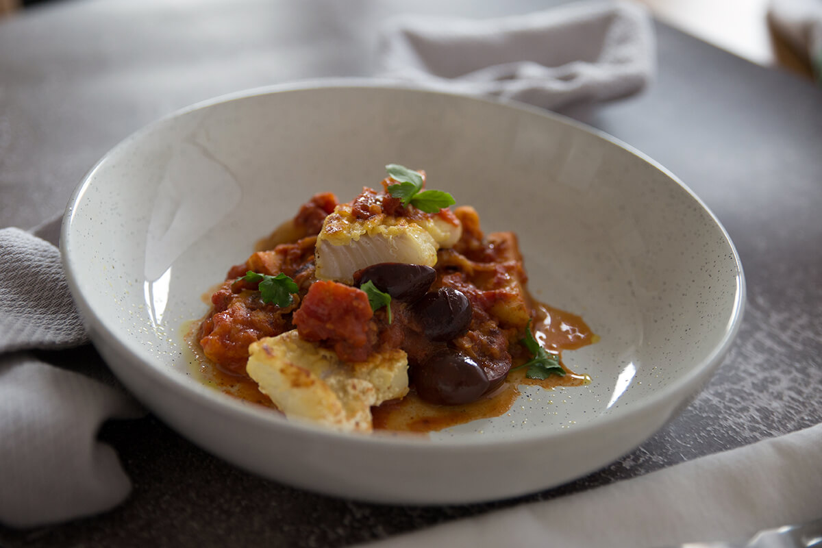 Cod with tomato sauce and potatoes. A very tasty fish dish - Gluten Free