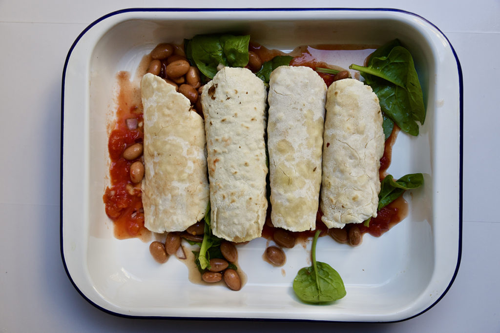 Enchiladas with tomato and spinach