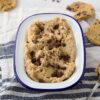 chickpea cookie dough in a enamel dish and few baked cookies on the right