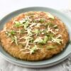 potato galette on a green plate