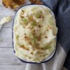 mashed potatoes in a falcon dish, with crispy potatoes skin on top